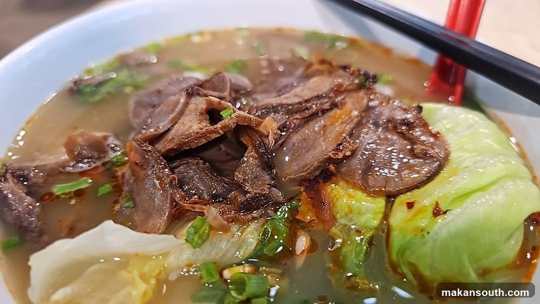 Bowl of Beef Noodle Soup with Vegetables