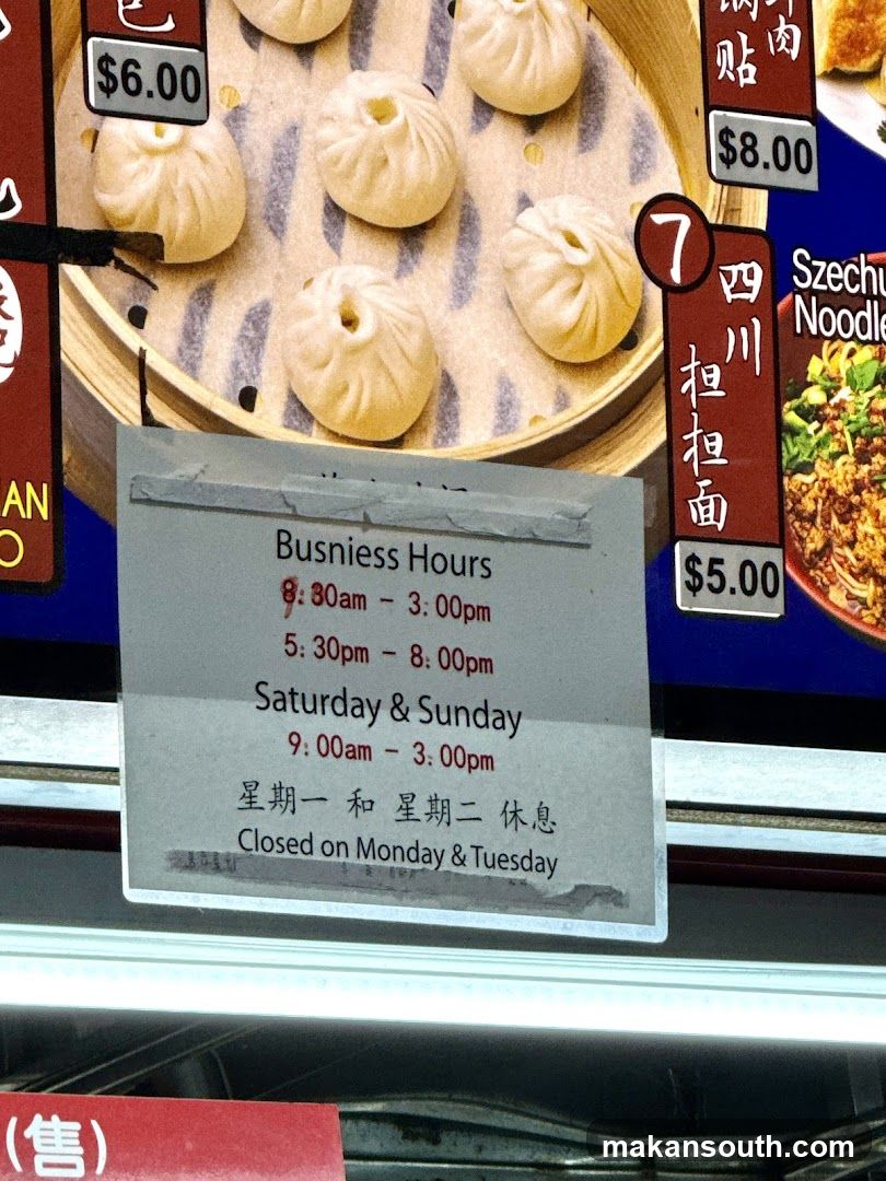 Food Display with Hours Sign