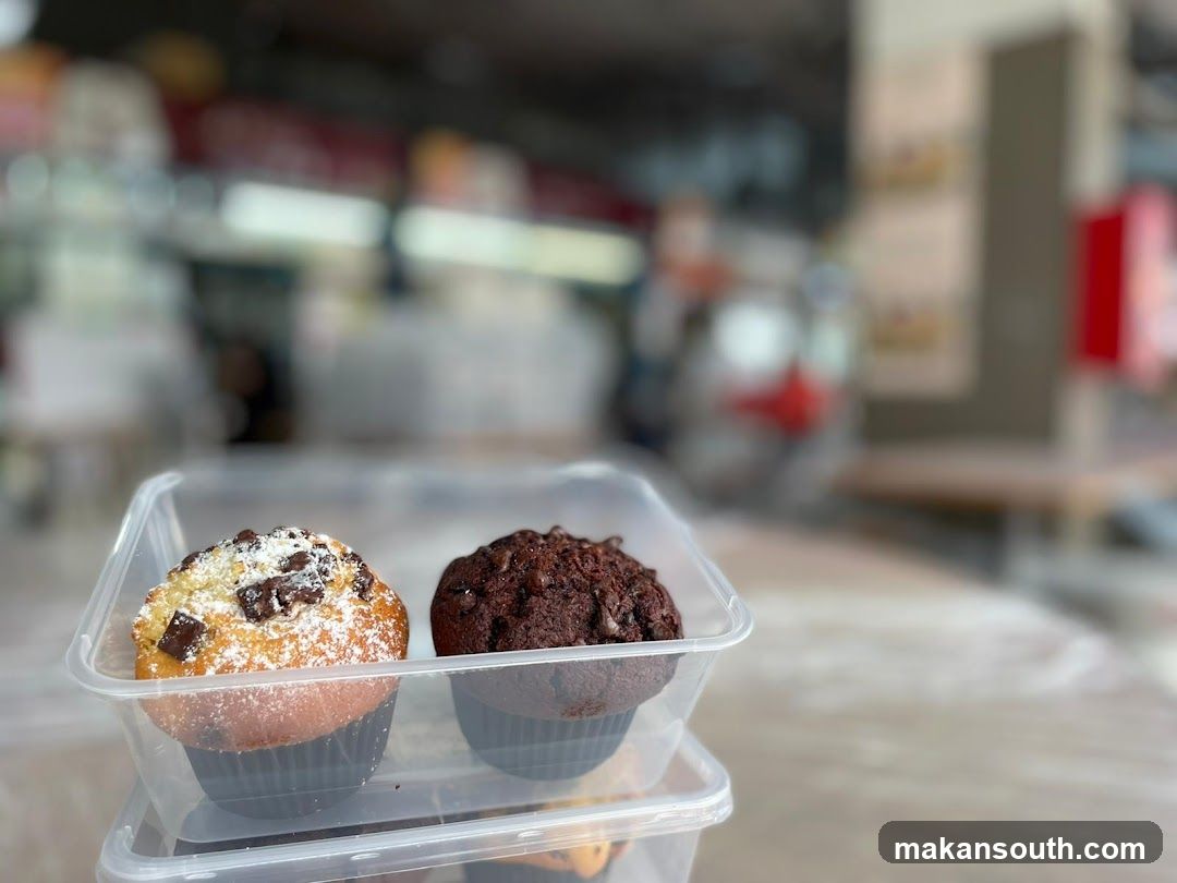 Muffins in plastic container