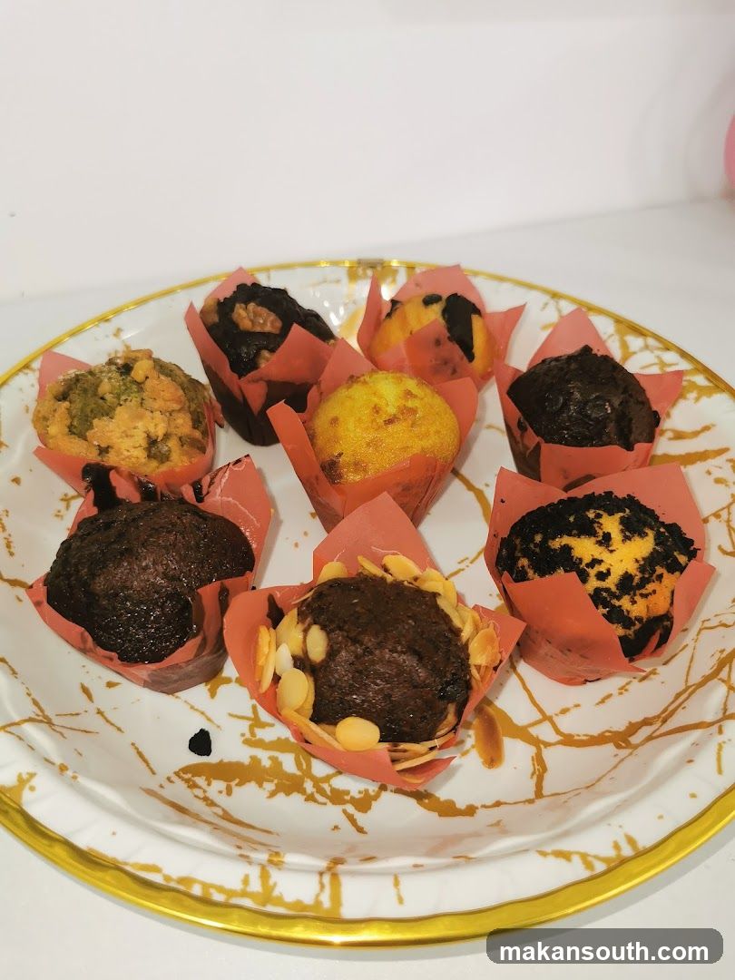 Assorted Muffins on a Decorative Plate