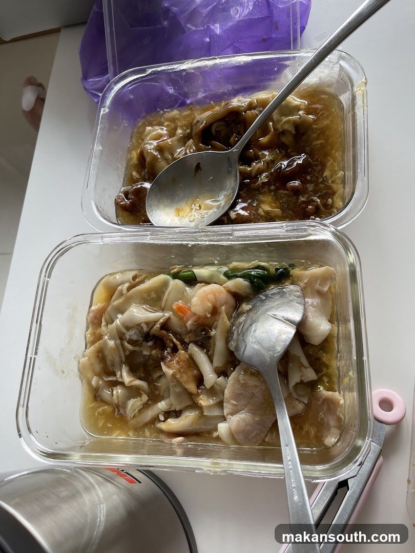 Takeout Meal Containers with Stir Fry and Noodles