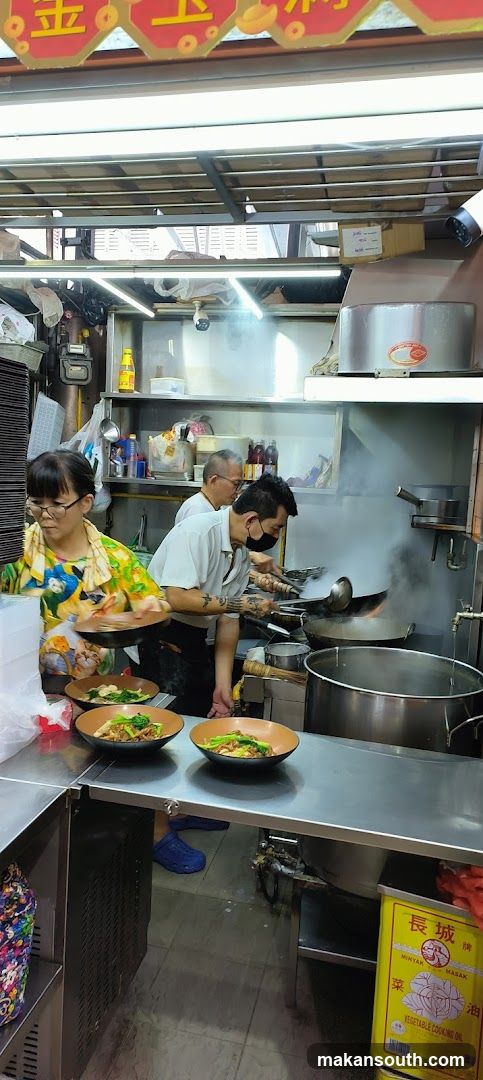 Kitchen Scene with Staff Cooking