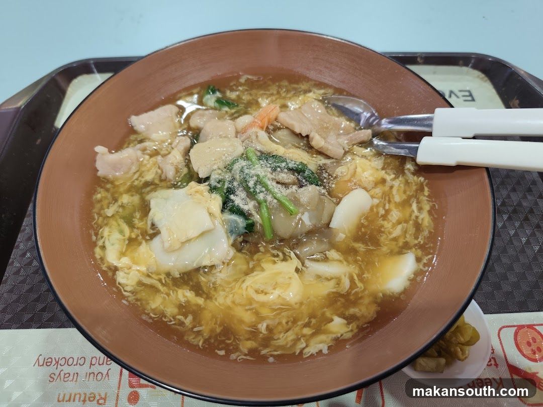 Bowl of Soup with Tofu and Vegetables