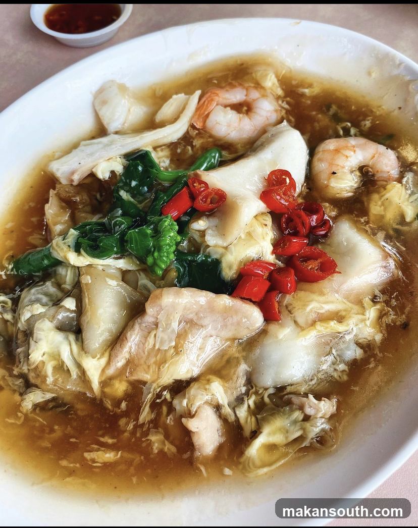 Steamed Fish with Pickled Cabbage and Chili