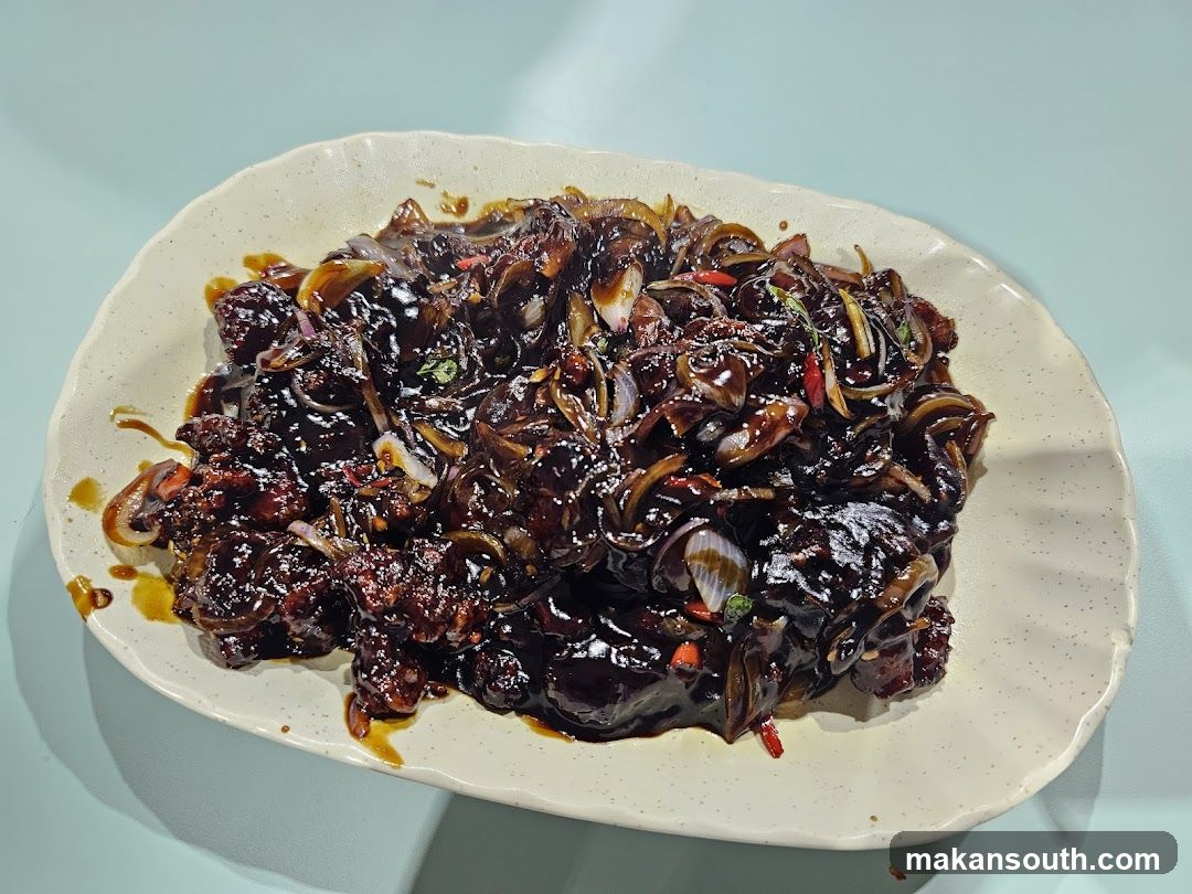 Sauced Meat Dish with Onions