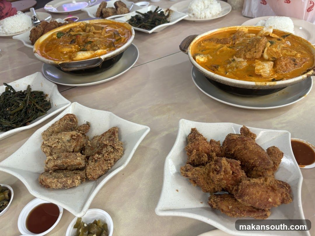 Fried Chicken and Curry Dishes Table Spread