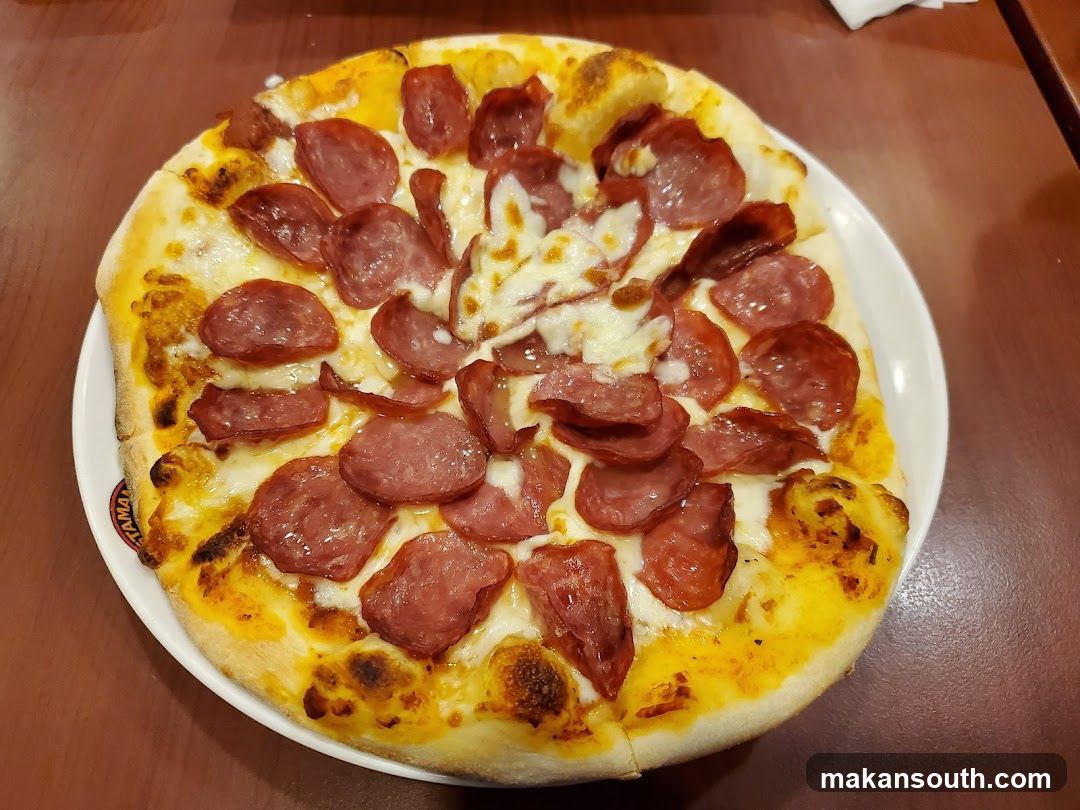 Pepperoni Pizza on White Plate