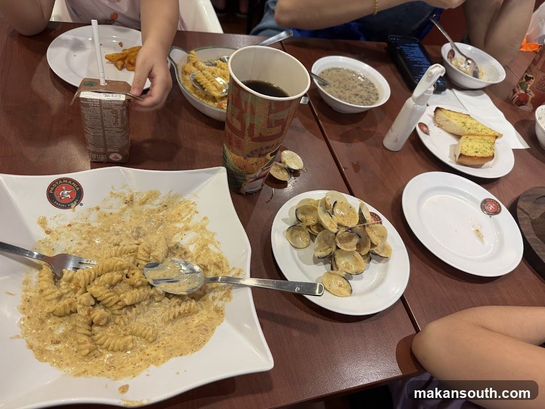 Dining Table with Pasta and Clams