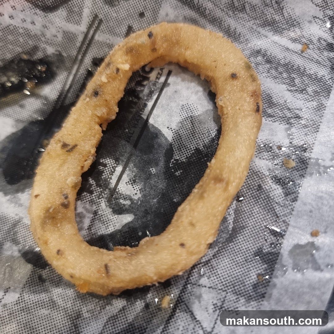 Fried Onion Ring on Paper
