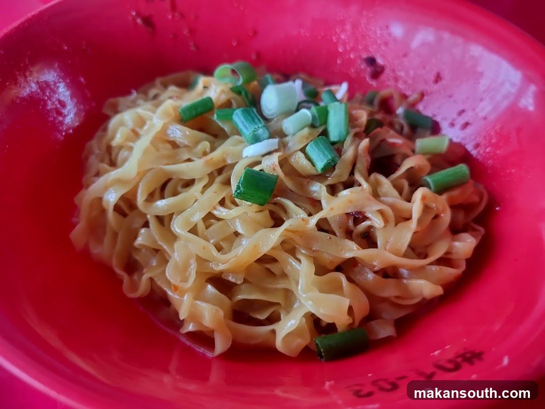 Noodles in Red Bowl