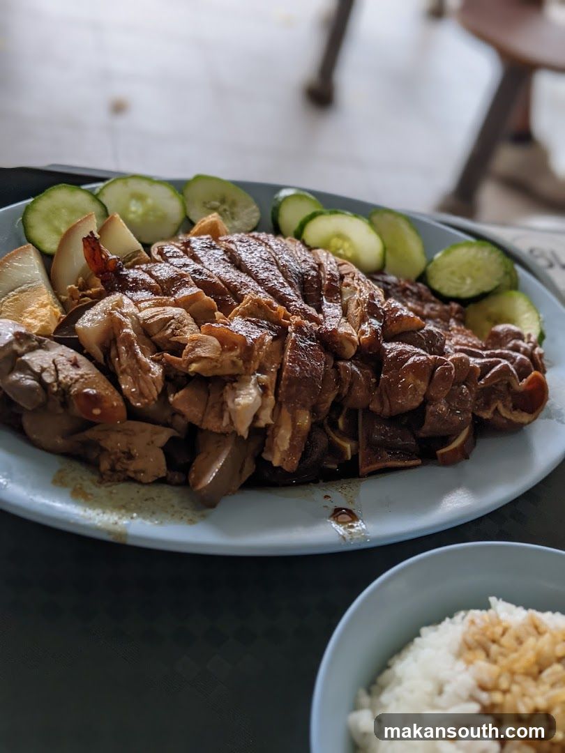 Roasted Chicken Plate with Rice and Cucumber Slices