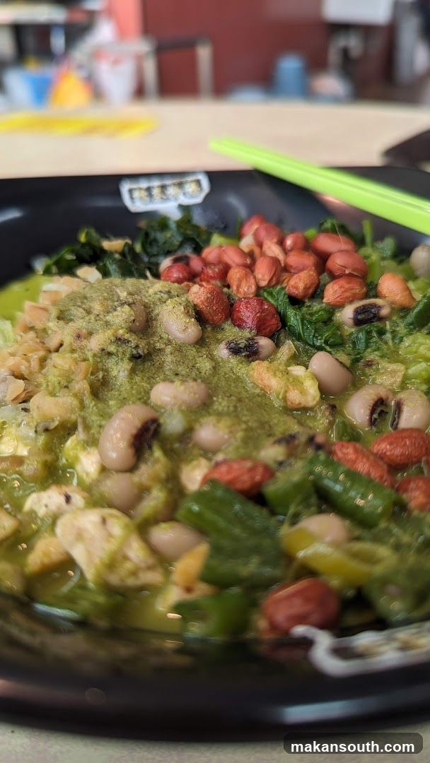 Bowl of Green Curry with Beans and Peanuts