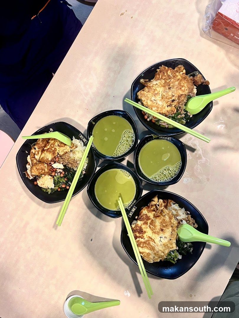 Food Table with Bowls of Rice and Soup