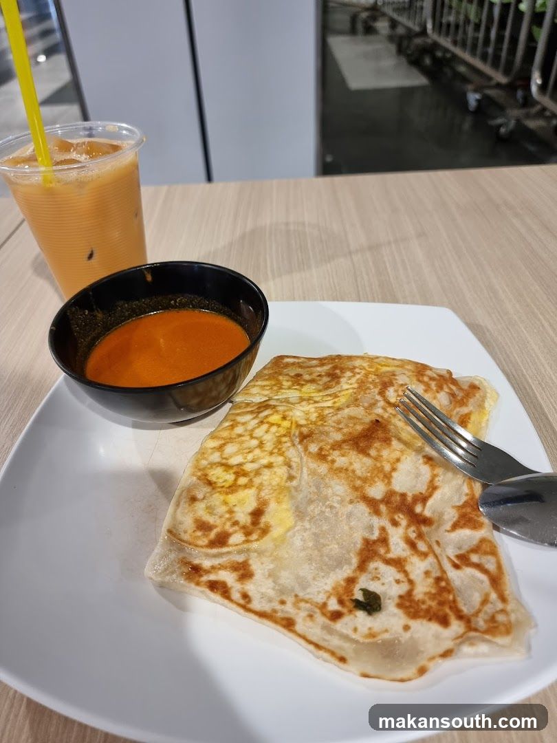 Roti Canai with Curry and Iced Tea