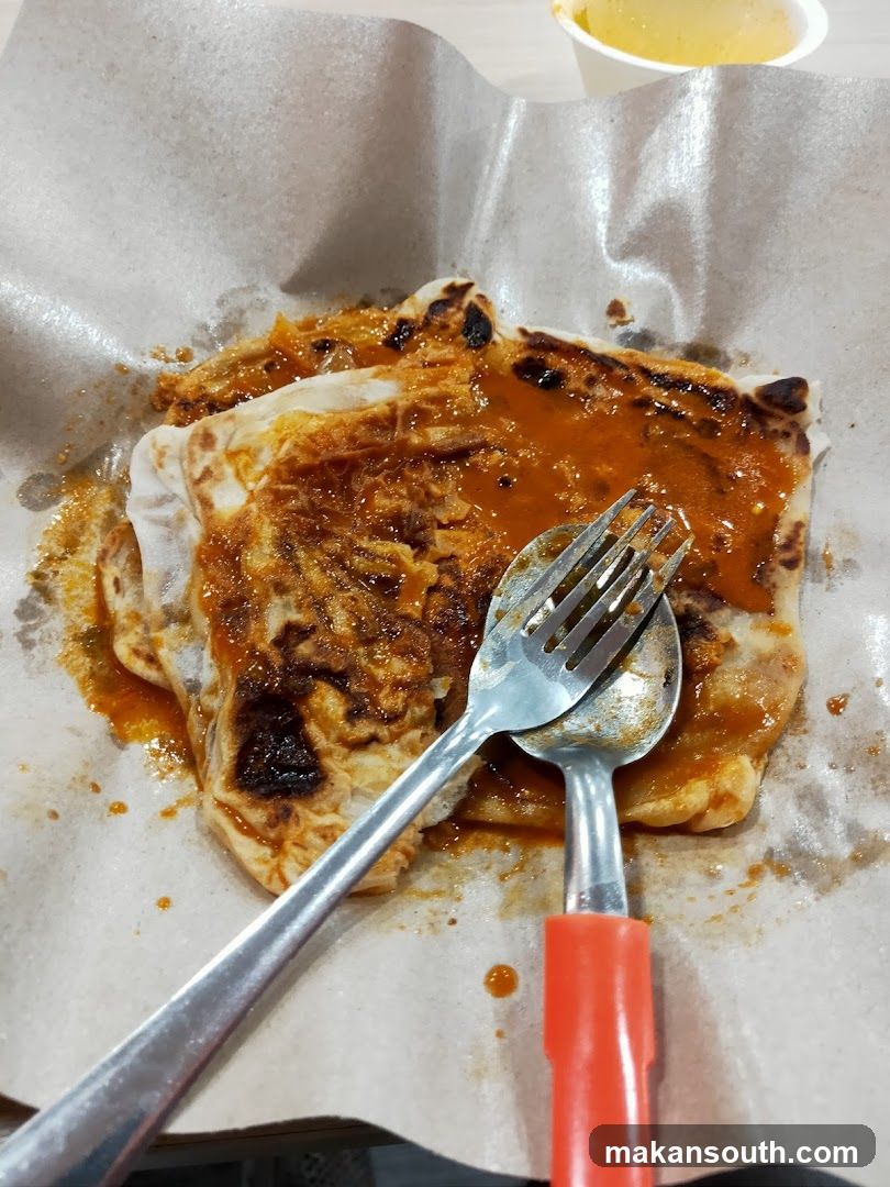 Food on paper with utensils