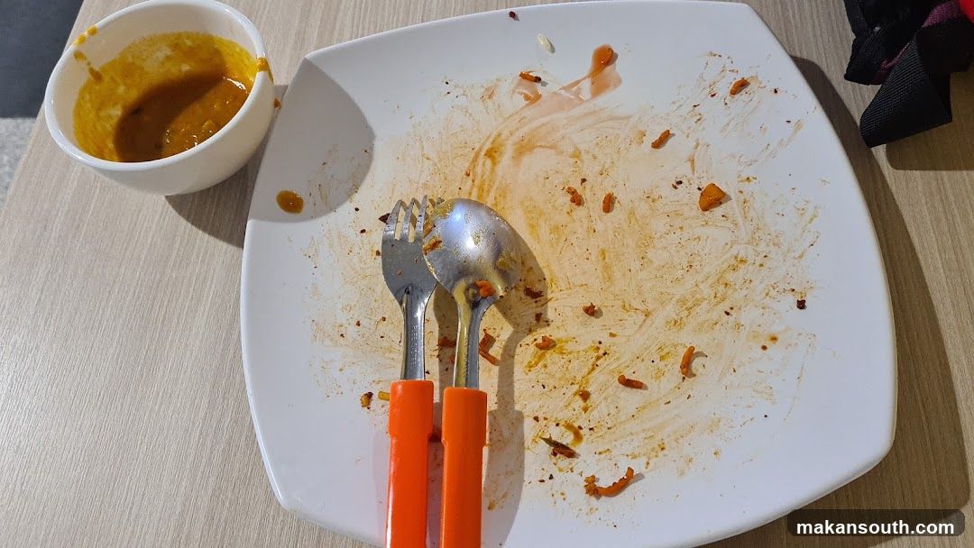 Empty Plate with Leftover Sauce