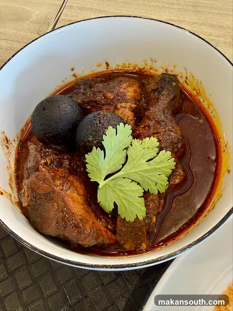 Spicy Chicken Curry with Black Eggs