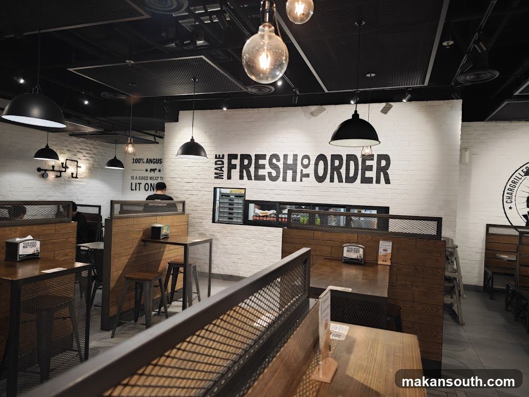 Restaurant Interior with 'Made Fresh Order' Signage