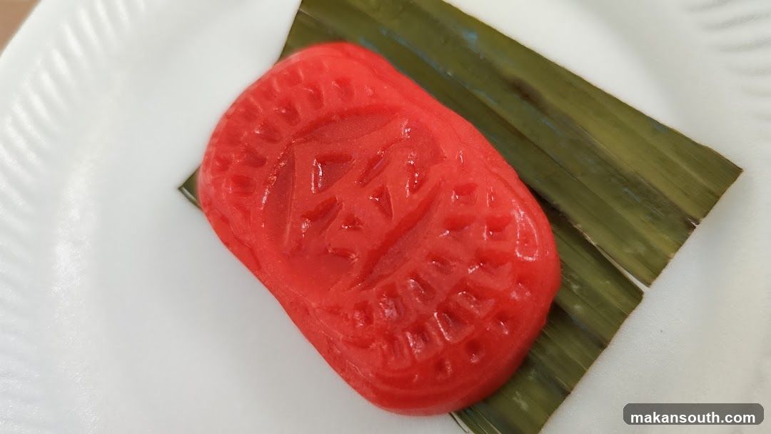 Red Kuih Lapis on Banana Leaf