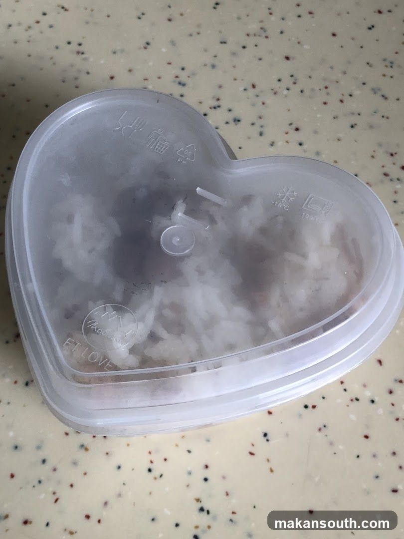 Heart-shaped food container with rice