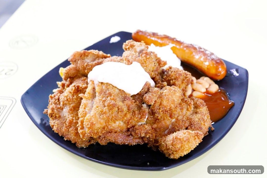 Fried Chicken Meal with Sausage and Beans