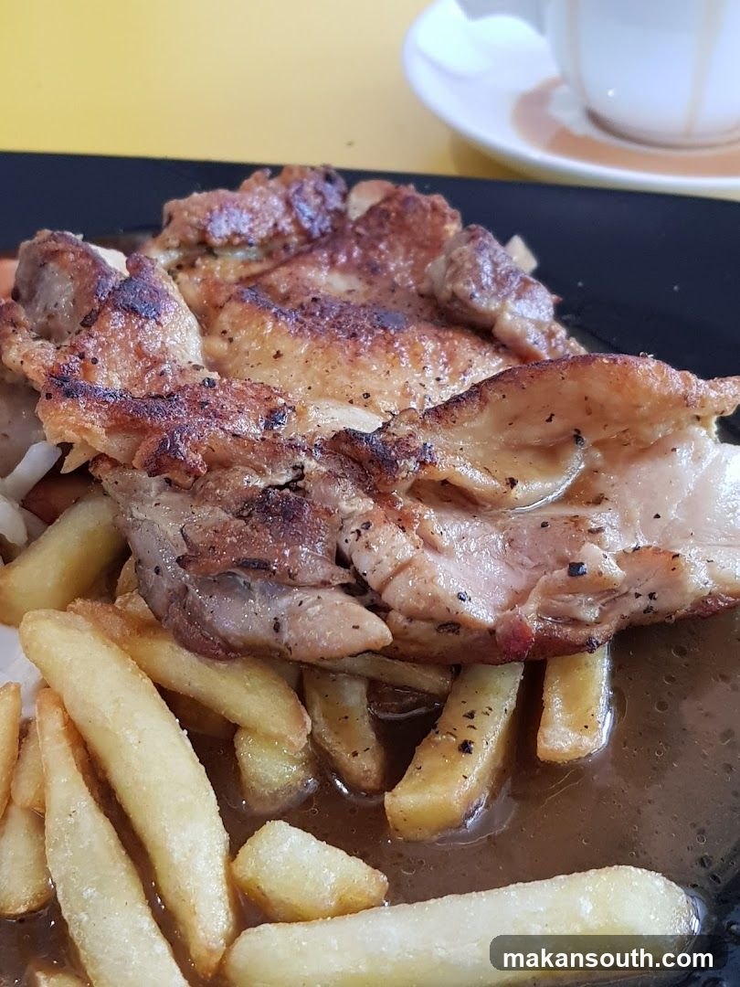Grilled Pork Chop with Fries and Gravy