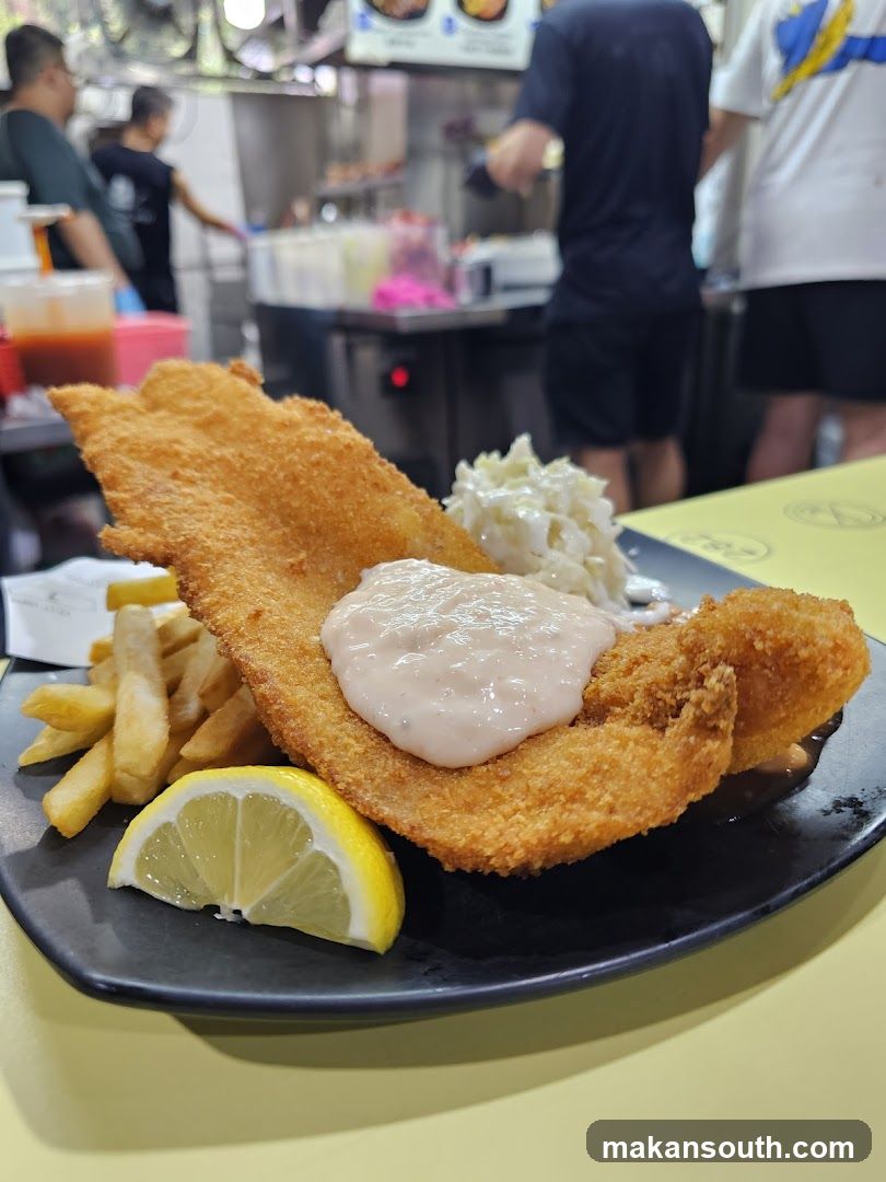 Breaded Fish Fillet with Fries and Coleslaw