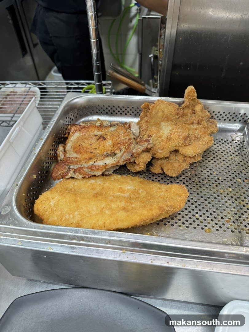 Fried Chicken and Fish in Kitchen Tray