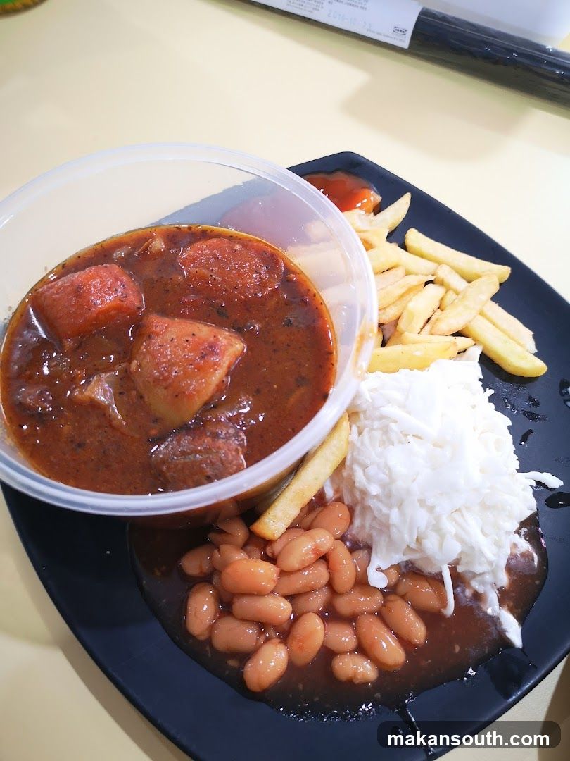 Curry Meal with Fries and Beans