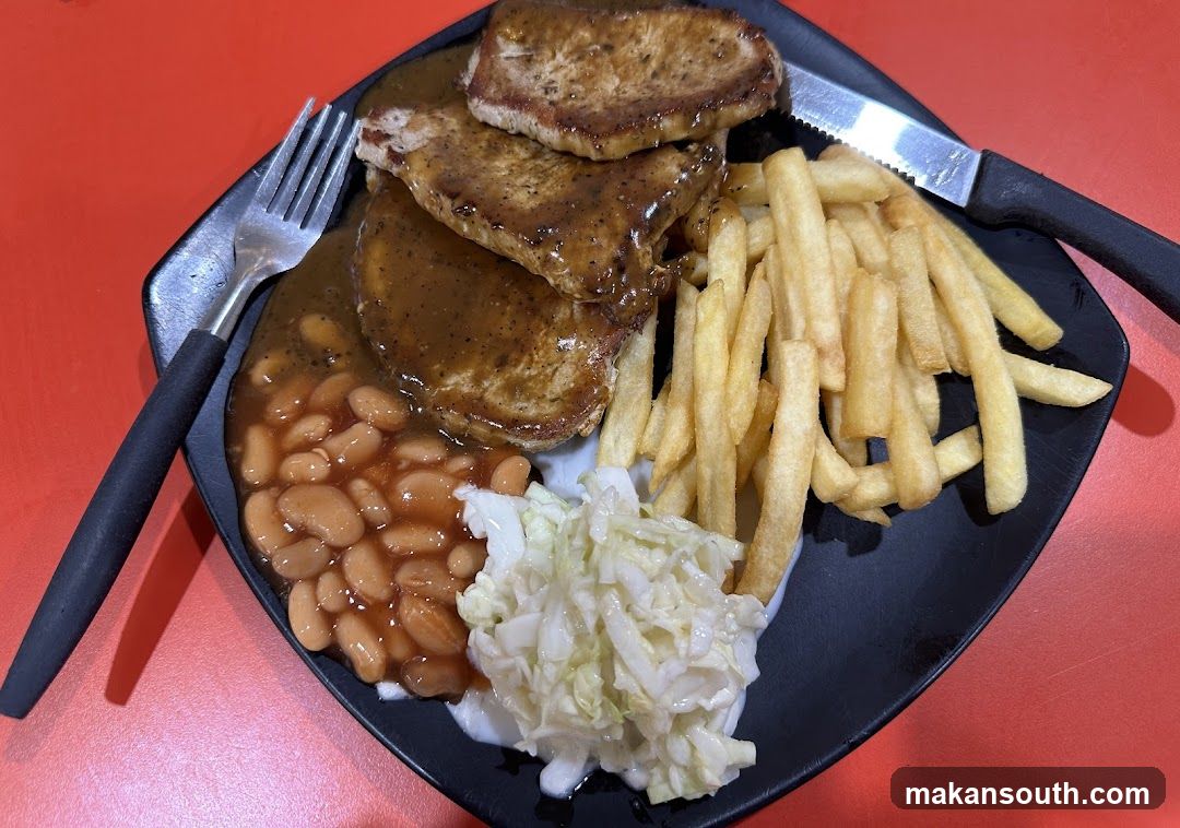 Plate of Fried Meat with Fries and Beans