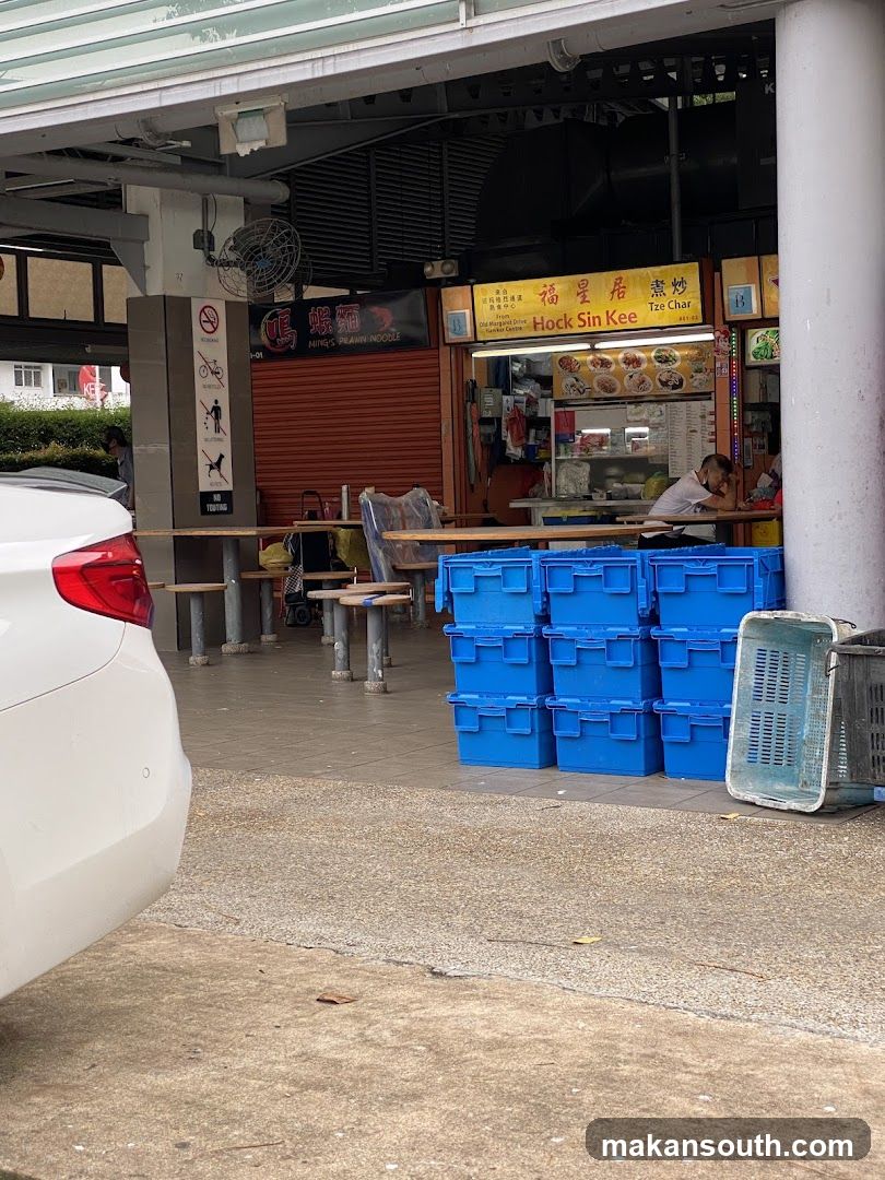 Food Stall Exterior with Blue Storage Containers
