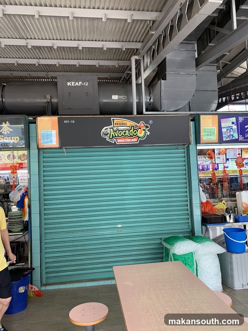 Closed Food Stall with Avocado Signage