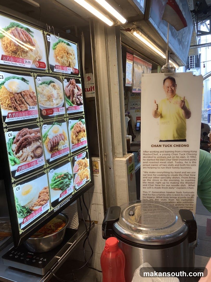 Food Stall Interior with Menu Board and Staff Poster