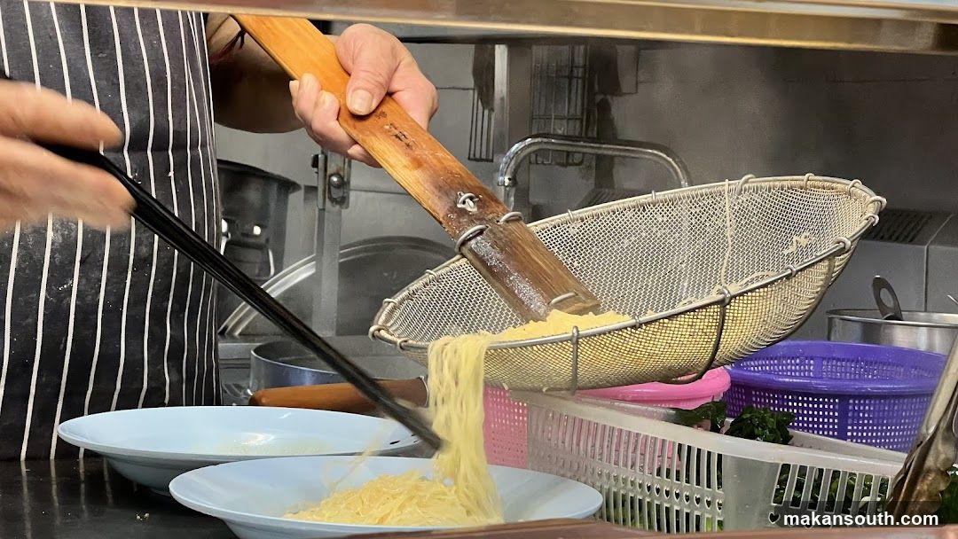 Noodle Preparation in Kitchen
