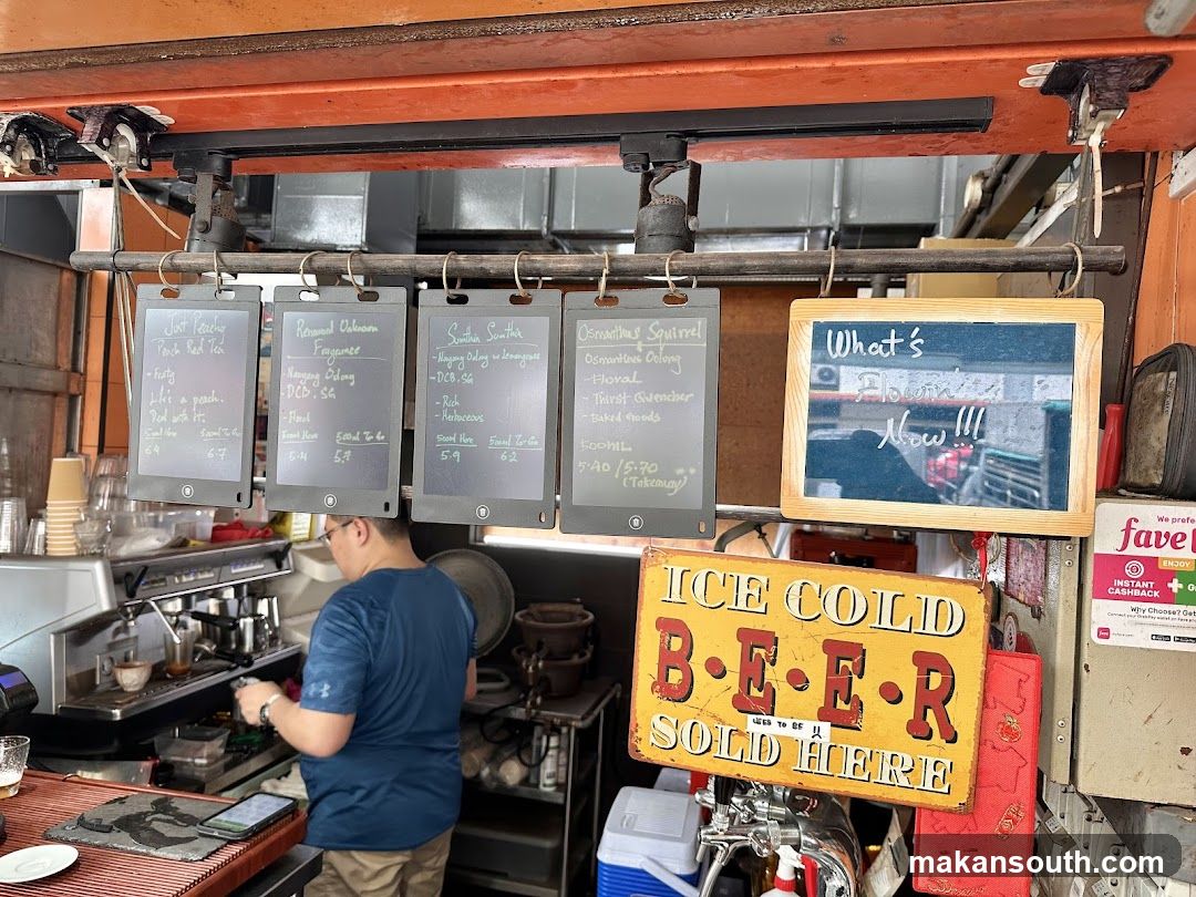 Coffee Shop Interior with Menu Boards and Staff