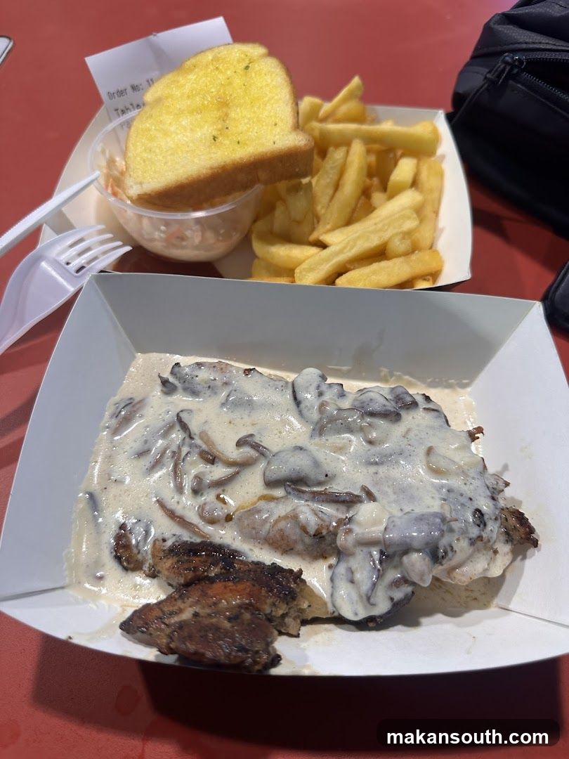 Mushroom Gravy Steak with Fries and Garlic Bread