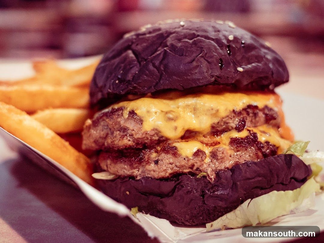 Black Burger with Cheese and Fries