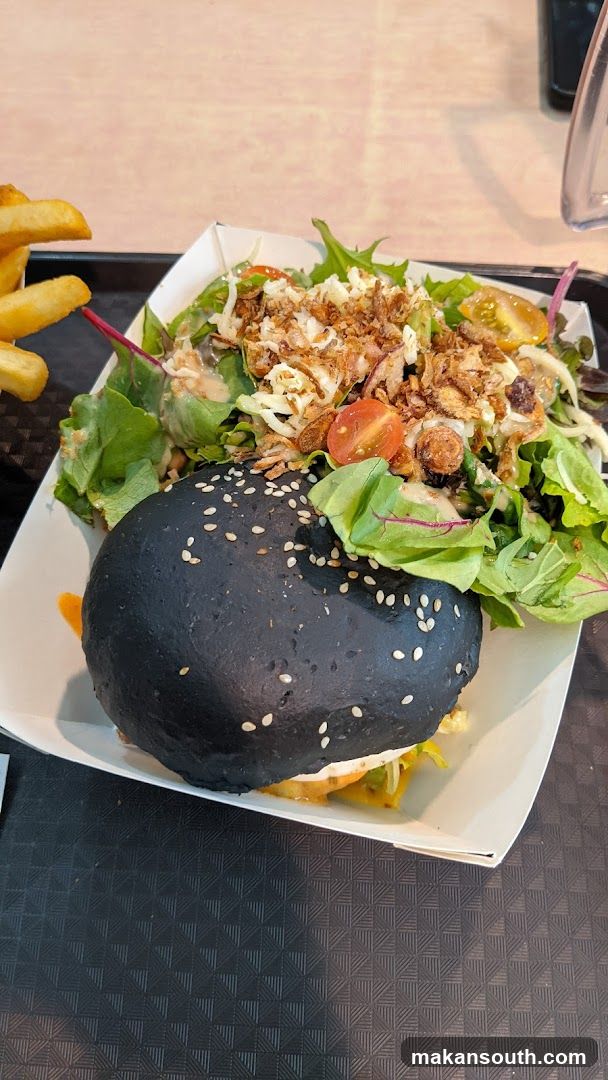 Black Burger with Salad and Fries