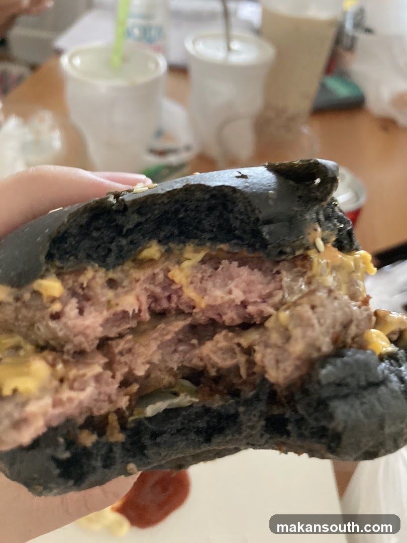 Black Buns Burger with Cheese and Meat Patties