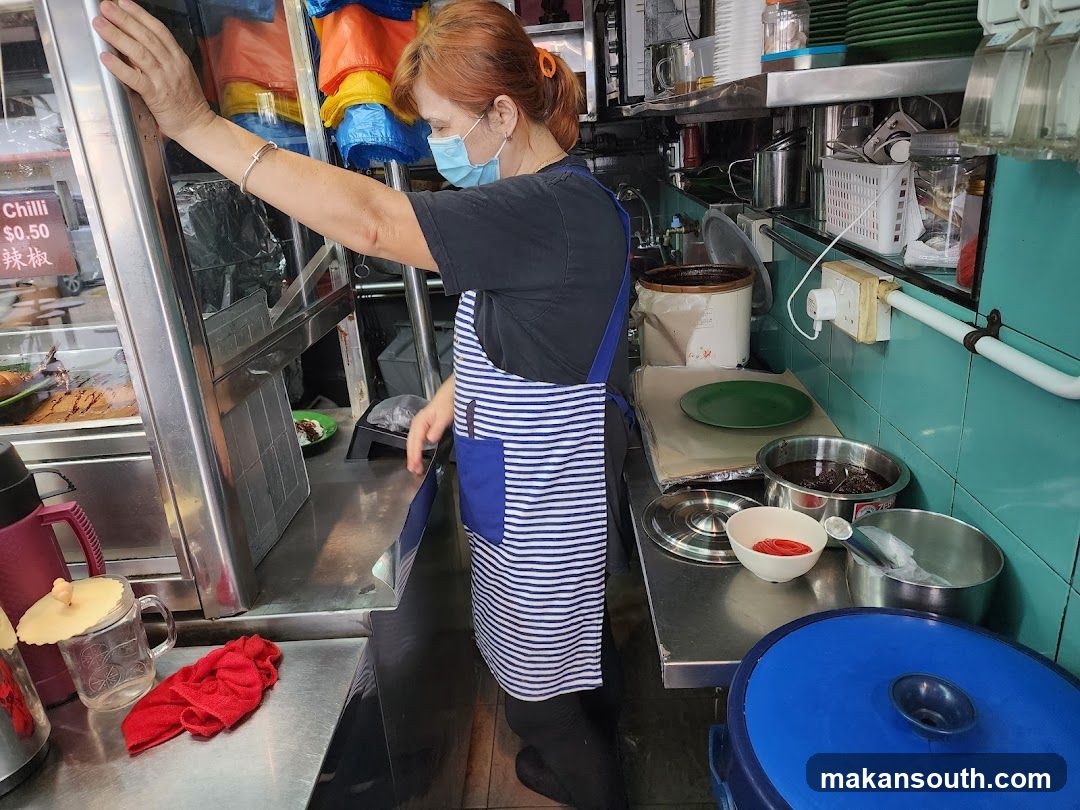Food Stall Interior with Staff