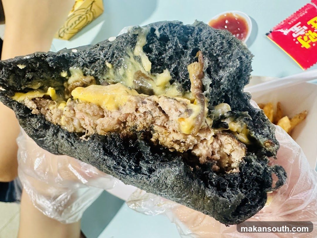 Black Bun Burger with Cheese and Meat