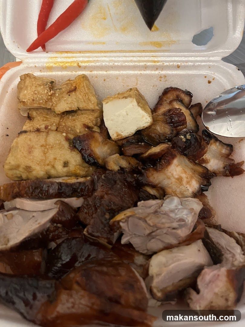 Roasted Meat and Tofu in Takeout Container