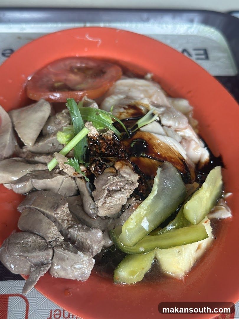 Bowl of sliced meat with condiments