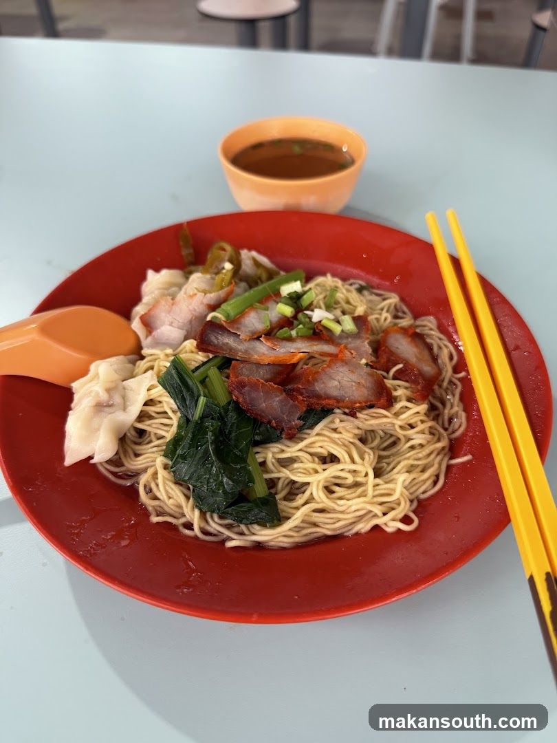 Noodle Dish with Chopsticks and Soup Bowl