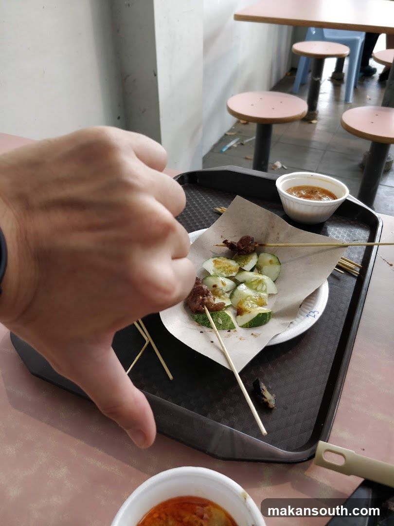 Food Tray with Skewers and Sauce