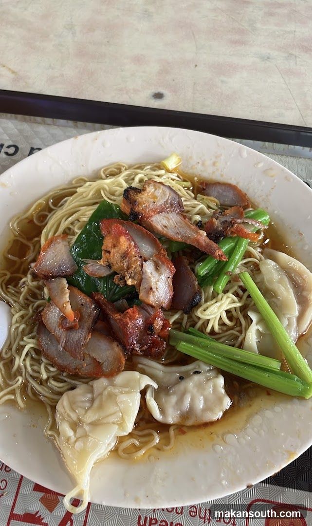 Noodle Dish with Dumplings and Roast Meat