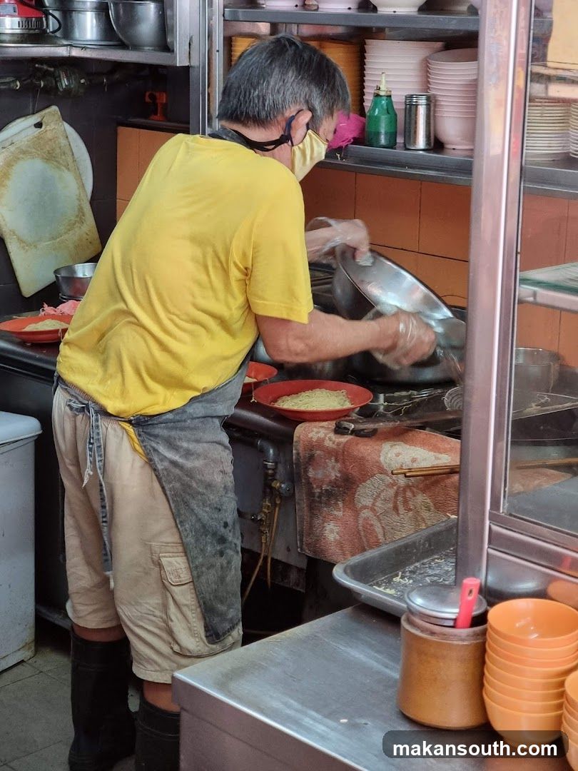 Chef Preparing Food in Kitchen