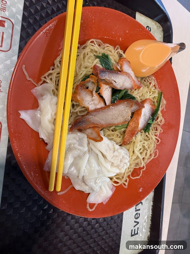 Noodle Dish with Chopsticks and Sauce