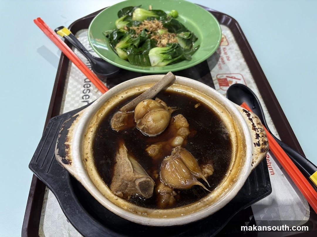 Cantonese-style stew and greens on a tray