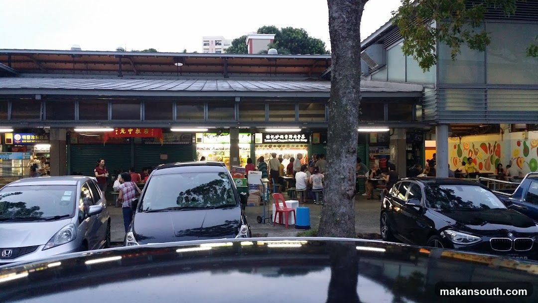 Food Court Exterior with Cars Parked